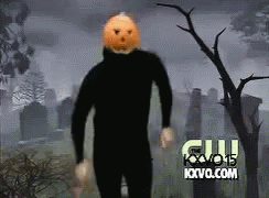 GIF of a dancing man with a pumpkin mask on